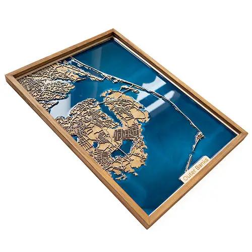 Custom wooden map with epoxy resin featuring a detailed map of Outer Banks in a wooden frame. Perfect for personalized home decor or gifts.