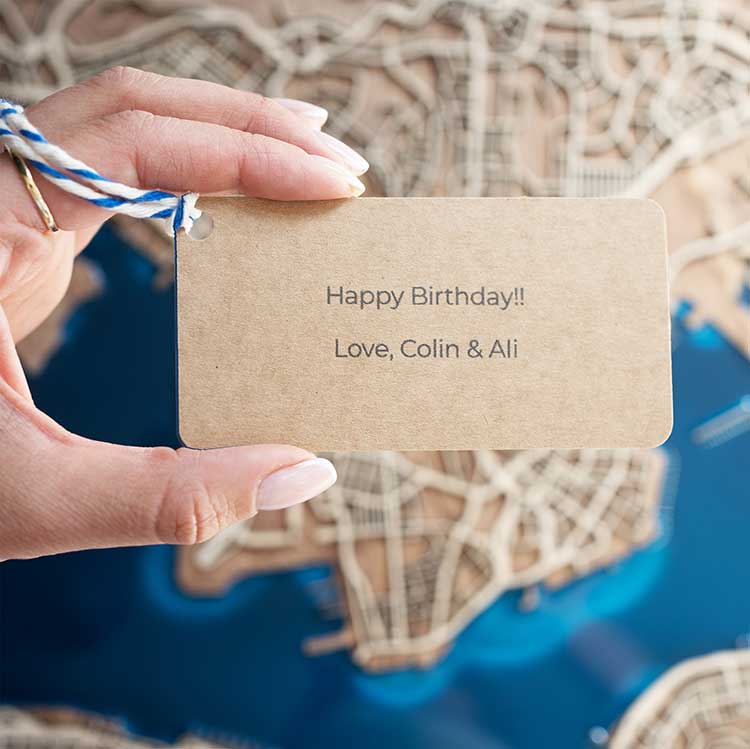 small brown gift card with 'Happy Birthday!! Love, Colin & Ali' text
