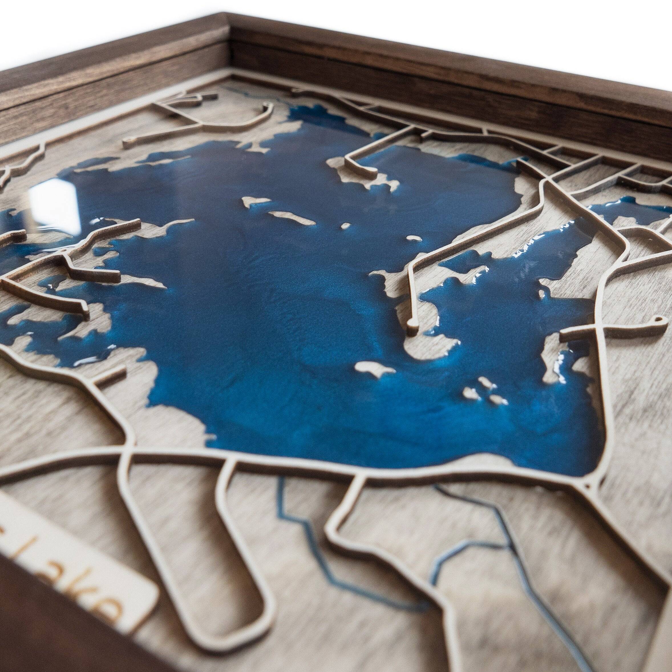 A wooden map of Hickory Hills Lake, featuring a mesmerizing blue multi-toned resin in the water reservoir. This enchanting wooden map is the ideal gift for nature lovers, lake enthusiasts, or anyone with a special connection to Hickory Hills Lake. With its unique design and attention to detail, this one-of-a-kind piece is a perfect gift for any occasion. #woodenmap #HickoryHillsLake #naturelovers #resinart #perfectgift